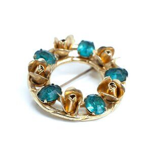 Vintage Gold Tone Floral Brooch with Teal Blue Faceted Stones